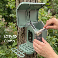 Cleaning the green Chirppie bird feeder camera compartment (16 of 17)